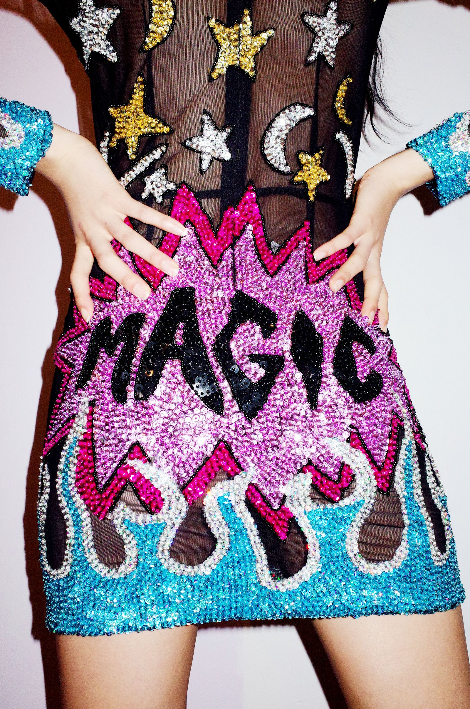 The Pegasus Mesh Mini Dress The Pegasus Mesh Mini Dress